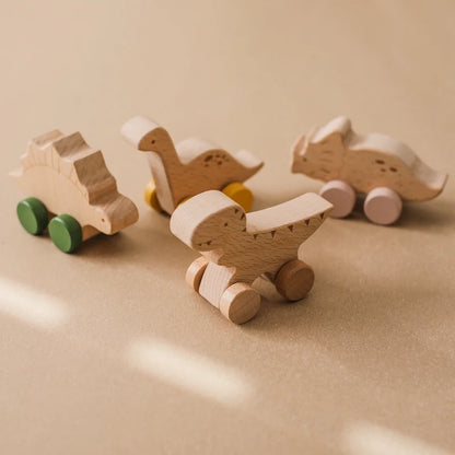 Pull Dinosaur On Wheels